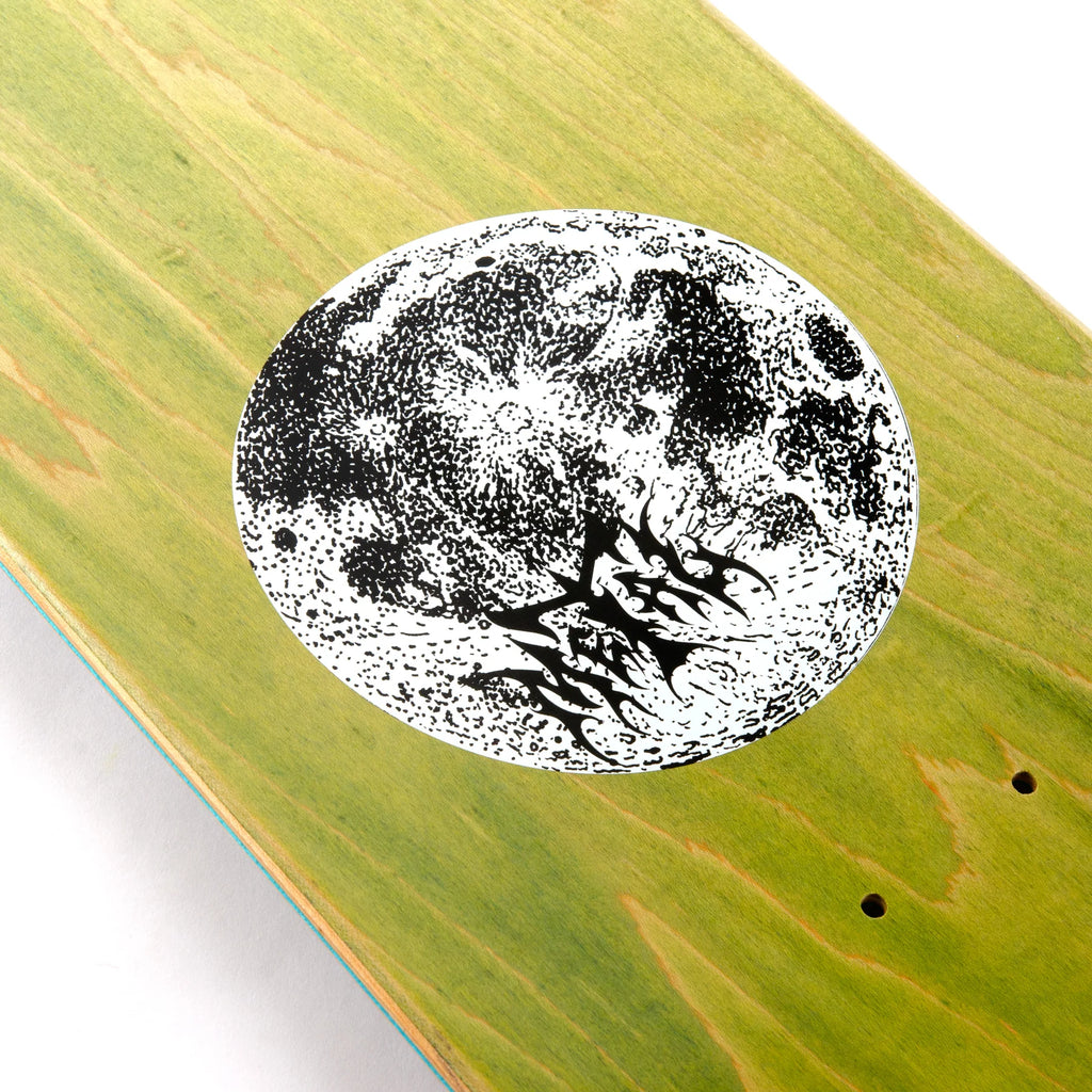 A METAL skateboard with an image of a moon on it.