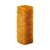 A rectangular, rough-textured pillar of golden-brown Himalayan salt against a white background, reminiscent of the grip of a MOB Grip Tape Cleaner by MOB.