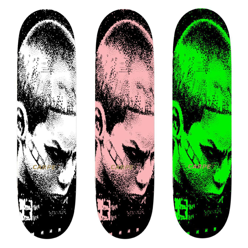 Three CARPET COMPANY TROUBLE skateboards featuring a man's face, created with base colors and free from stains.
