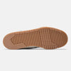 The image displays the gum rubber outsole of the NB NUMERIC 440 V2 TRAIL LOW SEA SALT / DEEP OCEAN skate shoe, showing a textured tread and "new balance" branding near the heel.