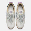 Top view of NB NUMERIC 440 V2 TRAIL LOW SEA SALT / DEEP OCEAN skate shoes in white and green with purple accents, patterned laces, tan lining, gum soles, and signature NB Numeric details on a white background.
