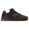 The NB NUMERIC REYNOLDS 933 BROWN / BLACK by NB NUMERIC features a brown and black suede/mesh upper, black logo, durable rubber sole, and ABZORB midsole for superior cushioning.