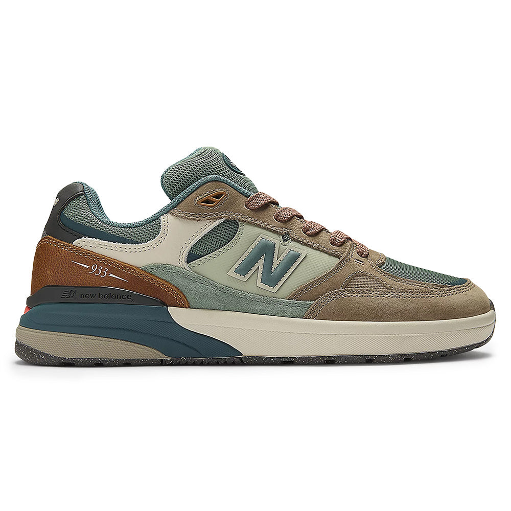 The NB NUMERIC REYNOLDS 933 MUSHROOM / NEW SPRUCE sneaker by NB NUMERIC is shown in green, brown, and beige tones with an ABZORB midsole in a side profile on a white background.