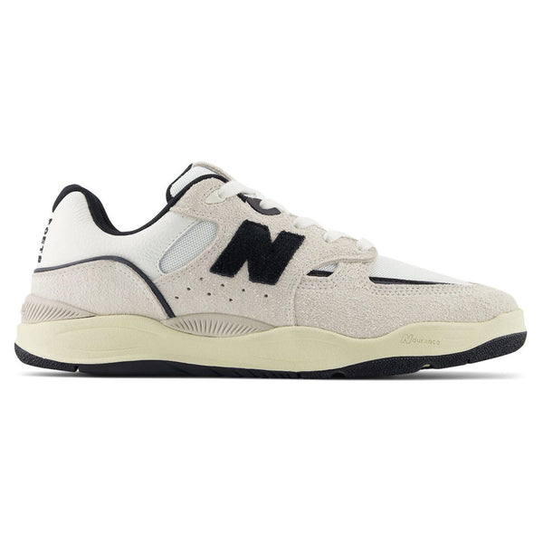 The NB NUMERIC 1010 TIAGO x POETS sneak in white and black.