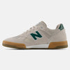 The NB Numeric Knox 600 Timber Wolf / Forest Green sneaker features a gum sole and a prominent "N" logo on the side, designed as part of the NB Numeric collection.