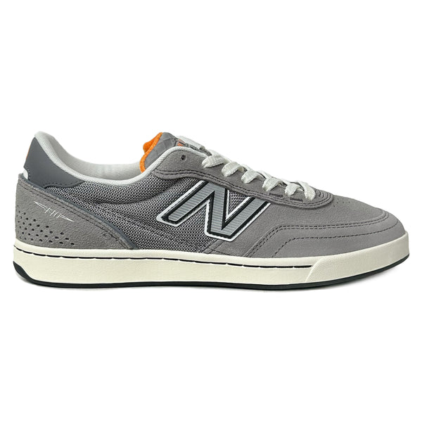 NB NUMERIC x VU 440 V2 GREY / ORANGE skate shoe with white and orange accents, displayed against a white background.