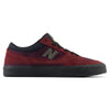 Side view of a red and black NB Numeric 417 Franky Villani Low Burgundy / Phantom cupsole skate shoe with a grey "N" logo on the side and black rubber sole, perfect for the everyday skater.