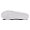 Bottom view of a white NIKE SB ORANGE LABEL BLAZER LOW PRO GT ISO sneaker displaying a herringbone tread pattern on the sole, ideal for gripping your skateboard.