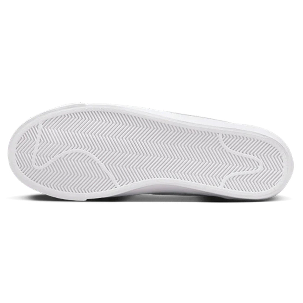 Bottom view of a white NIKE SB ORANGE LABEL BLAZER LOW PRO GT ISO sneaker displaying a herringbone tread pattern on the sole, ideal for gripping your skateboard.