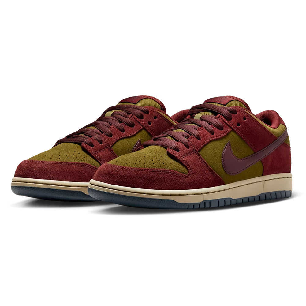 The nike NIKE SB DUNK LOW PRO DARK TEAM RED / OLIVE FLAK features Olive Flak and burgundy suede panels, a Dark Team Red Swoosh, and cream-colored midsoles.