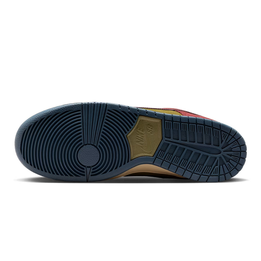 The image shows the sole of the nike NIKE SB DUNK LOW PRO DARK TEAM RED / OLIVE FLAK, with a blue circular tread pattern and an Olive Flak nike SB logo near the heel.