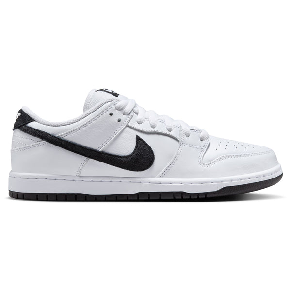 The NIKE SB DUNK LOW PRO WHITE/BLACK-WHITE-BLACK by Nike showcases a white low-top design with a black suede upper, accented by a bold black swoosh and a sturdy rubber outsole.