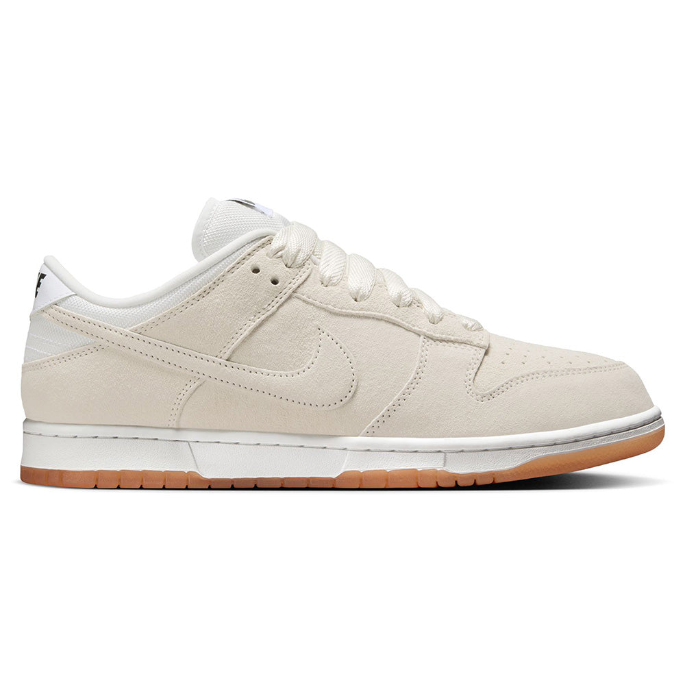 The nike SB DUNK LOW PRO B PALE IVORY / SUMMIT WHITE features a beige suede upper, white laces, white midsole, and gum rubber outsole with skate-specific upgrades, shown in a side profile view.