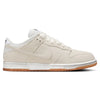 The nike SB DUNK LOW PRO B PALE IVORY / SUMMIT WHITE features a beige suede upper, white laces, white midsole, and gum rubber outsole with skate-specific upgrades, shown in a side profile view.