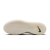The image displays the outsole of the NIKE SB NYJAH 4 WHITE / BLACK-WHITE-BLACK skate shoe by nike, featuring a translucent, wavy tread and a black Swoosh logo for lightweight durability.