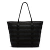 The NIKE RPM TOTE (26L) BLACK by Nike is a spacious recycled polyester tote featuring two shoulder straps and a stylish, textured horizontal stripe design for added durability.