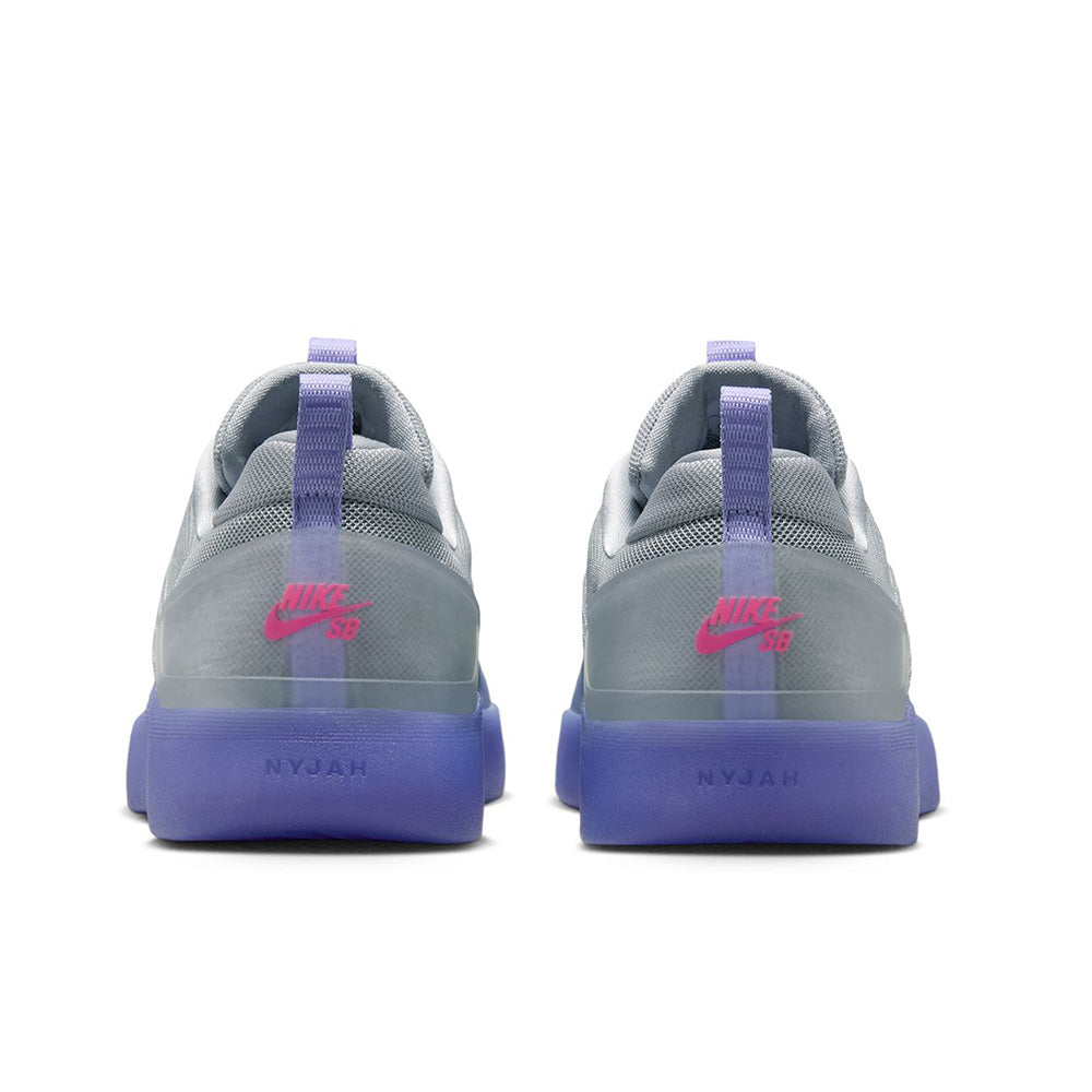 Rear view of the NIKE SB NYJAH 4 in LT THISTLE/BLACK-LT THISTLE-WOLF GREY-HYPER PINK by nike, with purple soles and pink heel logos—engineered for lightweight durability and responsive cushioning.