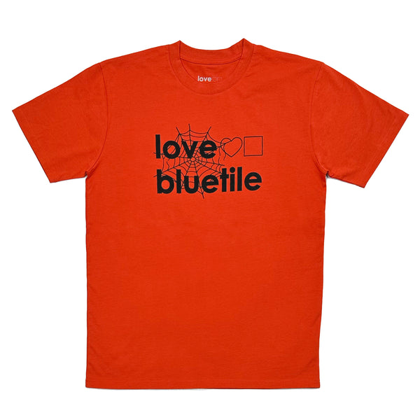 A red tee with the word "love 2 Bluetile" on it.