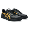 ASICS JAPAN PRO BLACK / PURE GOLD skateboarding sneakers with a textured finish, durable design, and ASICS logo on the tongue feature black color with gold stripes and details.