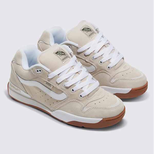 A pair of beige and light blue VANS ROWLEY XLT UTILITY RAINY DAY sneakers with white laces displayed on a white background.