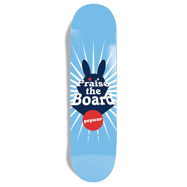 The CHOCOLATE POPWAR PRAISE THE BOARD deck features a dark blue bunny, white rays, and "Praise the Board" in a red circle—a tribute to Cairo Foster’s Heritage program.