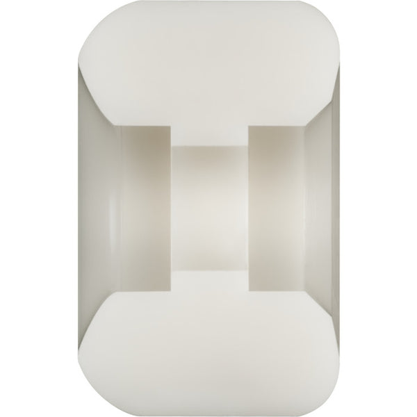 A geometric-shaped white wall light emitting a soft, diffused glow, reminiscent of the sleek design found in POWELL PERALTA NANO RAT DF V6 54x34MM 93A wheels.