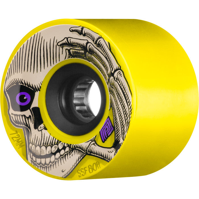A yellow wheel with a black core. The wheel has a skeleton graphic on the side