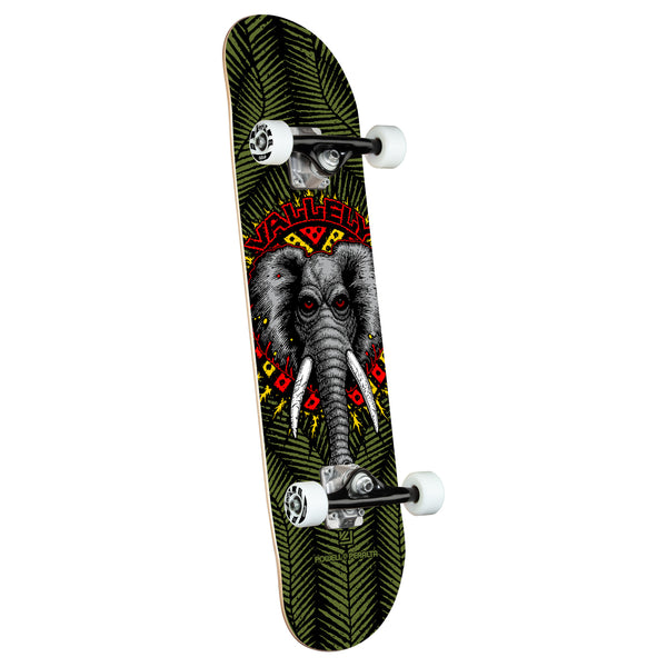 A complete Powell Peralta Vallely Elephant Olive skateboard with an elephant graphic design and green foliage pattern on the underside.
