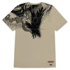 The PRIMITIVE X NARUTO X PAUL JACKSON CLONES TEE SAND features a black and gray crow design by Paul Jackson with abstract patterns, complete with a small Primitive logo at the bottom for a signature style.