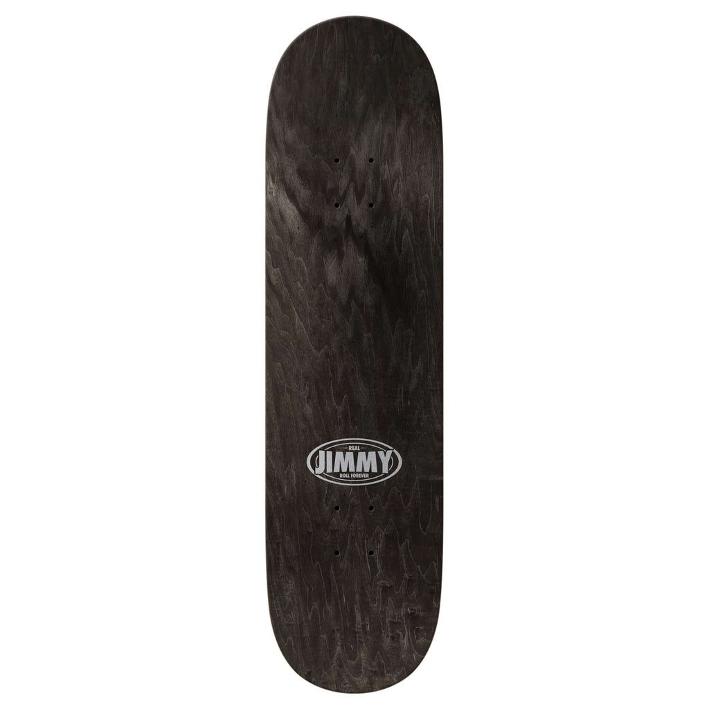 The REAL WILKINS ASTRONAUT by REAL is a black 8.5" skateboard deck with wood grain texture and "JIMMY" in white oval text at the center; classic 32.18" length for versatile performance.