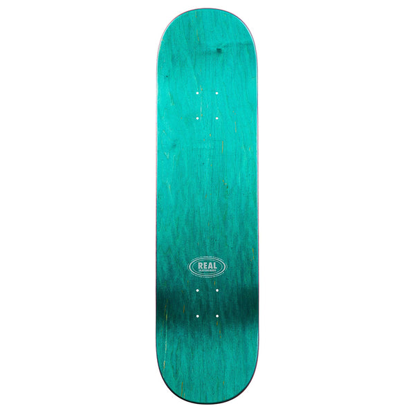 The REAL NICOLE CRUSH TWIN NOSE skateboard deck by REAL features a teal color, a bold white "REAL" logo at the center, and a 14.25" wheelbase, shown from above on a white background.