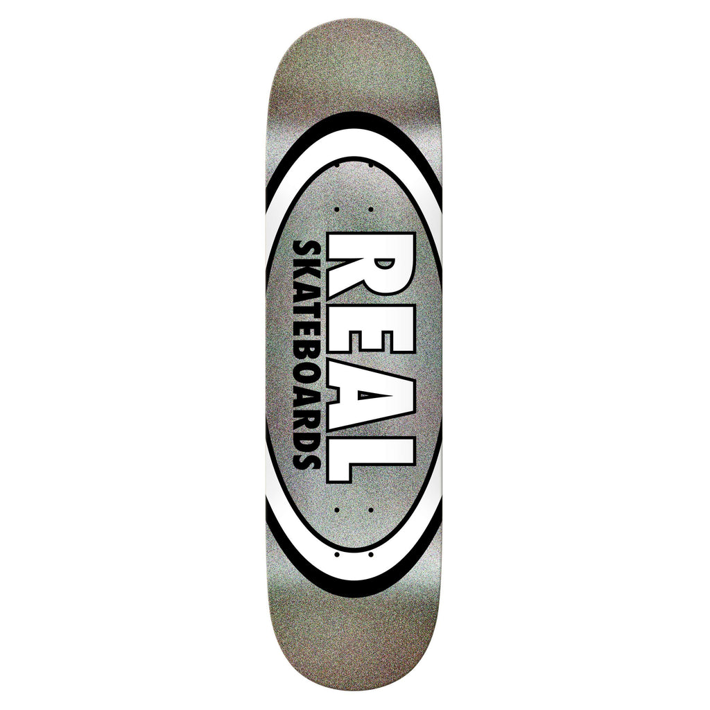 Silver REAL OVAL EASY RIDER SILVER skateboard deck with a black and white oval design in the center, featuring "REAL SKATEBOARDS" text in bold. This 8.25" wide beauty from REAL showcases the TRUE FIT MOLD for optimal performance.