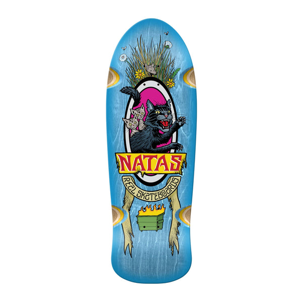 Limited edition blue skateboard deck, part of the REAL X SKATE SHOP DAY X NATAS X TODD FRANCIS series, showcases a black panther and butterflies amid lush plants on silver foil. The text "Natas" and "Real Skateboards" makes it a collectible for enthusiasts.