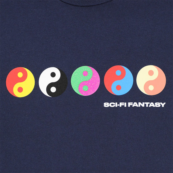 The SCI-FI FANTASY YIN-YANG TEE DARK NAVY features five colorful yin-yang symbols above "SCI-FI FANTASY" text, perfect for fans of the brand or anyone seeking a distinctive sci-fi fantasy shirt.