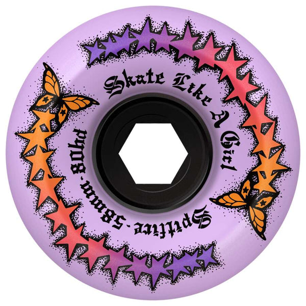 A skateboard wheel with a purple background features orange butterflies, red stars, and the text "Skate Like A Girl" along with "SPITFIRE" and "PHOENIX 58MM," made from durable Urethane.