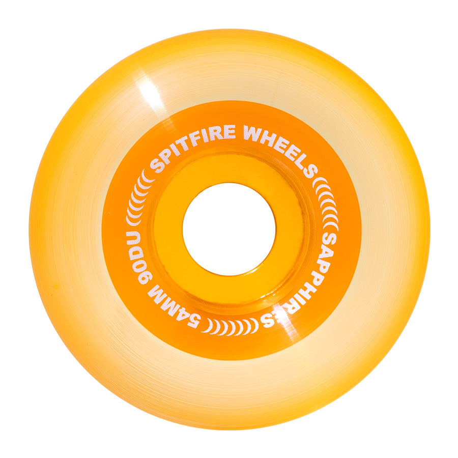 A orange/clear jelly looking wheel with the brand named around the core.
