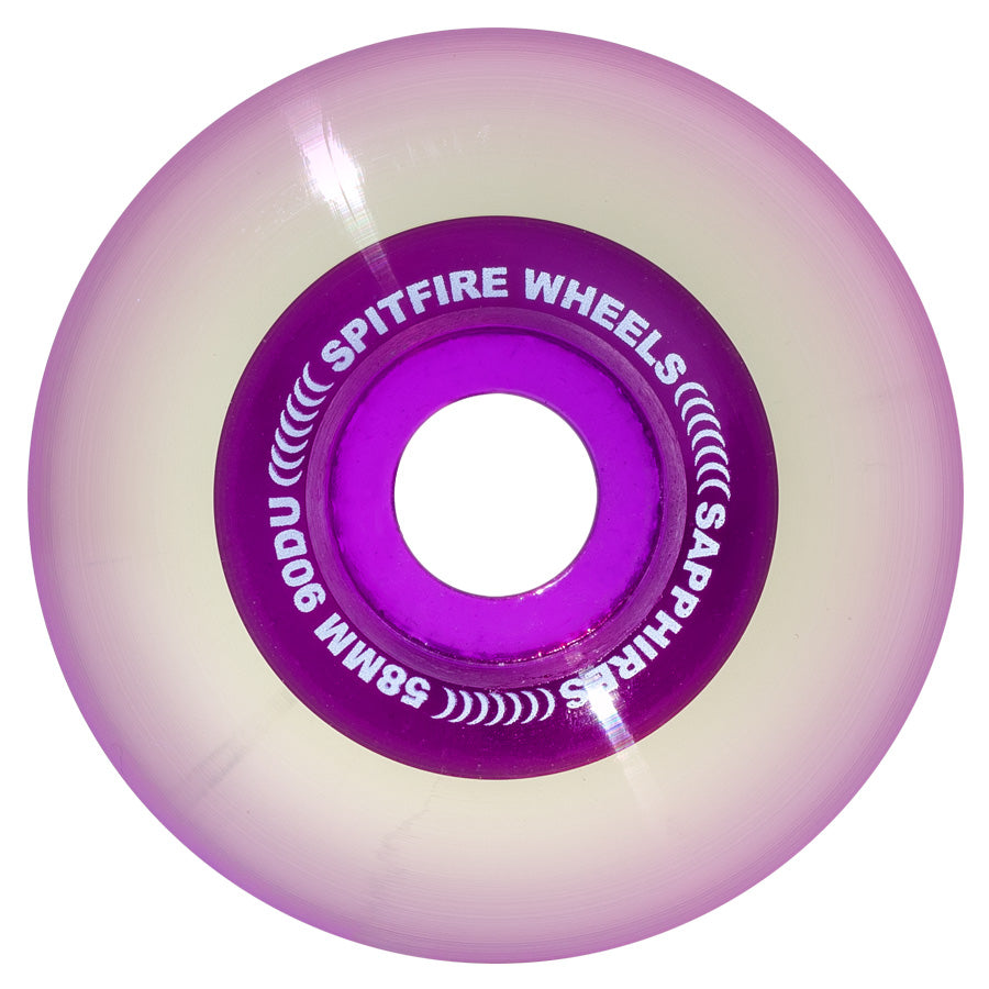 A purple/clear jelly looking wheel with the brand named around the core.