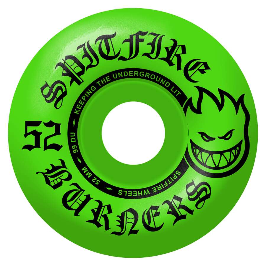 The SPITFIRE BURNERS 99D 52MM GREEN skateboard wheel features "Spitfire Burners" and "52" printed next to a smiley flame logo, designed with an entry-level urethane formula perfect for beginners.