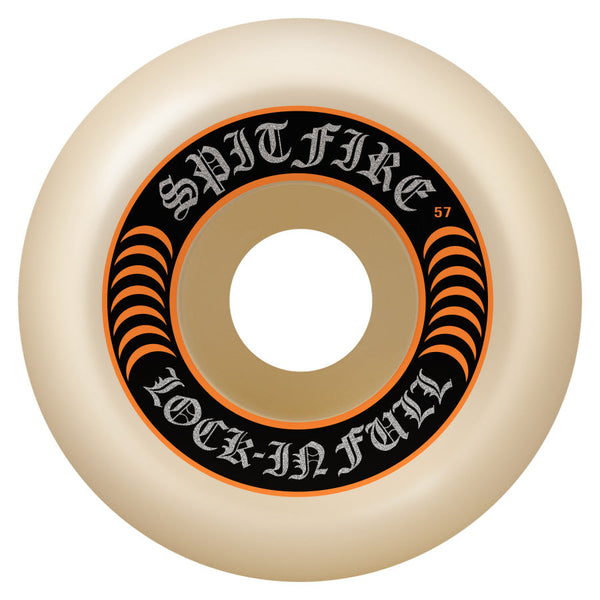 a white wheel with black and orange text