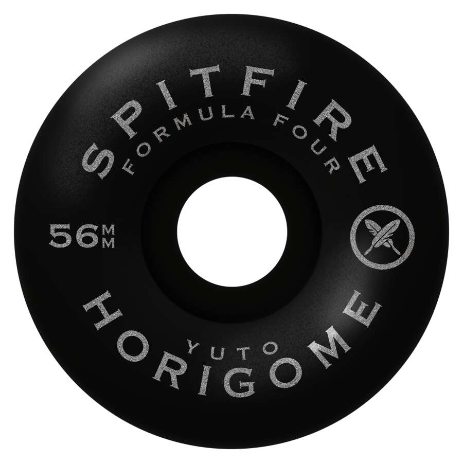 Close-up of a SPITFIRE F4 Yuto Cherry Blossom Classics 99D skateboard wheel in black, featuring the text "Formula Four" and "Yuto Horigome," along with a stylized logo. The 56mm diameter is prominently displayed, embodying the unique style of Yuto Cherry Blossom.