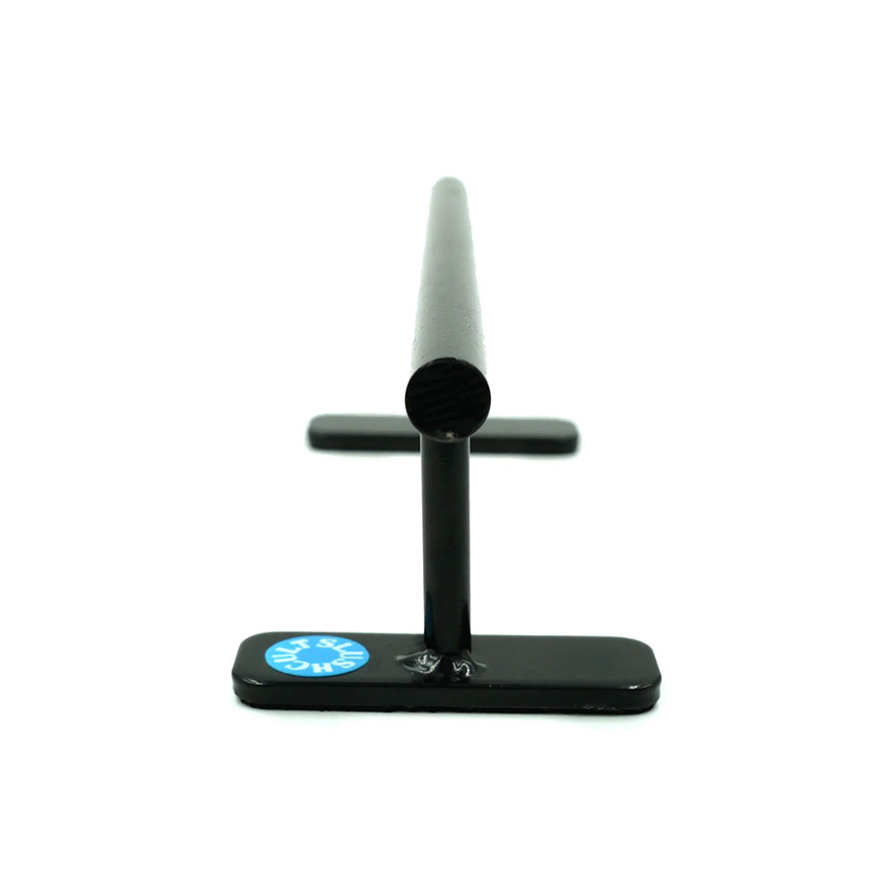The SLUSHCULT FLAT BAR is a powder-coated black metal fingerboard rail with a thick, round bar and rectangular base, shown end-on against a white background.