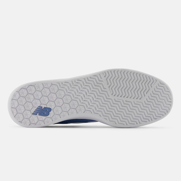 The sole of a new NB Numeric 440 V2 Blue/White skate shoe with a herringbone tread pattern.