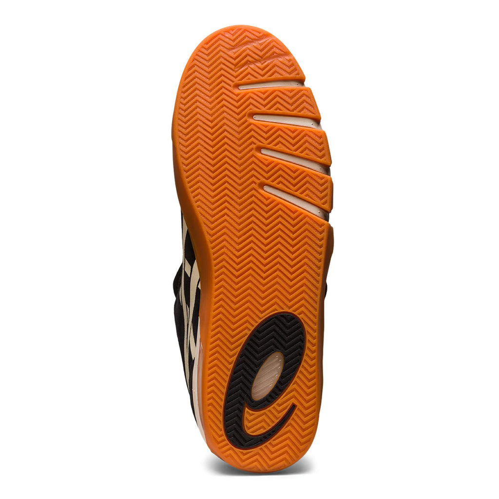An orange and black ASICS GEL-FLEXKEE PRO BLACK / BIRCH shoe on a white background.