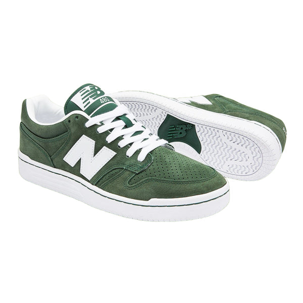 A pair of green NB NUMERIC 480 FOREST GREEN / WHITE sneakers with white soles and laces, featuring a prominent "n" logo on the side.