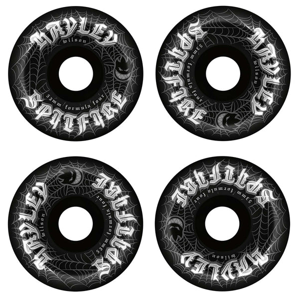 Set of four SPITFIRE HAYLEY WEBBED CONICAL FULL 99D 53MM BLACK skateboard wheels, featuring white spiderweb and jack-o'-lantern graphics with "Spitfire" and "Wilsons" in gothic lettering on the edge.