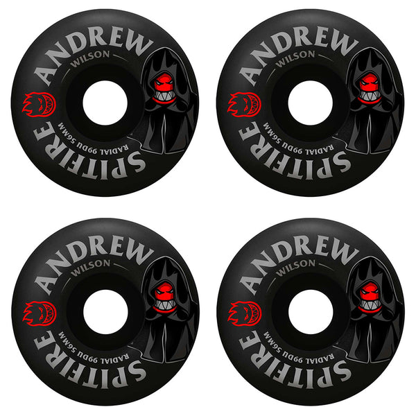 Four black SPITFIRE F4 WILSON BURN SQUAD RADIAL 99D 56MM skateboard wheels, each with a red hooded character graphic and "ANDREW WILSON RADIAL 99D" print. Durable design for smooth rides.