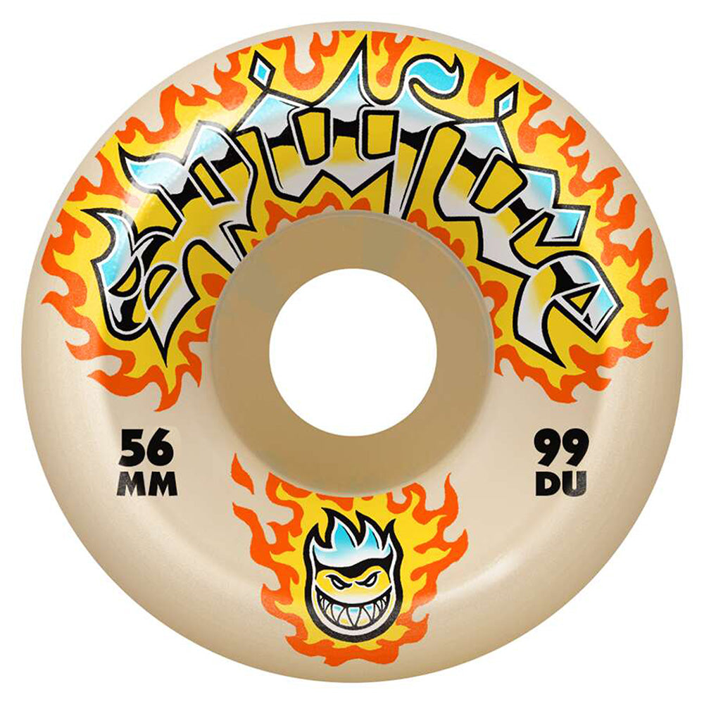 The SPITFIRE F4 CHROME VENOM CONICAL FULL 99D 56MM skateboard wheel features graffiti-style yellow “Spitfire” text with flames, a cartoon flaming face, and iconic Spitfire F4 design elements.