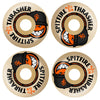 Four beige 54mm SPITFIRE X THRASHER F4 THE CITY RADIAL FULL 99D wheels feature a grinning cartoon face in a black cap with orange details, with “Spitfire Formula Four” and “Thrasher” text on the edge.