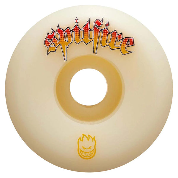 A close-up of a single cream-colored skateboard wheel, featuring "Spitfire" written in red lettering at the top and a flame face logo in yellow at the bottom. This SPITFIRE F4 VENOM SCRIPT CONICAL FULL 99D 54MM is crafted for performance, endorsed by pro skater Grant Taylor, and boasts a 99 Duro hardness.