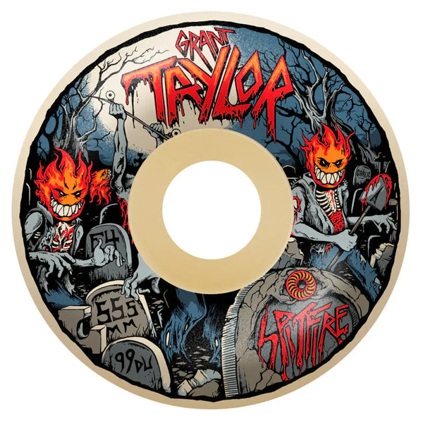 A skateboard wheel featuring an illustration of fiery, skeletal figures in a graveyard, with the names "Grant Taylor" and "SPITFIRE" in red, flame-like text. The SPITFIRE F4 GRANT UNDEAD 99D 55.5MM design is available for ultimate performance.